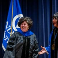 Samhita and President laugh on stage